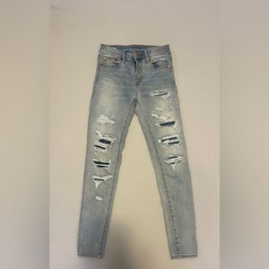 Size 4R. Light wash.